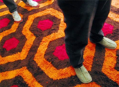 People Standing on Carpet With Red Wine Stains